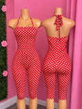 In The Spotlight — In The Spotlight is a red and white polka dot romper that's pure vintage glam with a modern twist